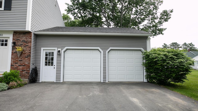 48 Clover Ln, Brewer, ME 04412 - garage with asphalt driveway