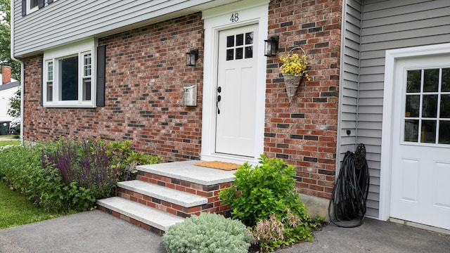 48 Clover Ln, Brewer, ME 04412 - property entrance with brick siding
