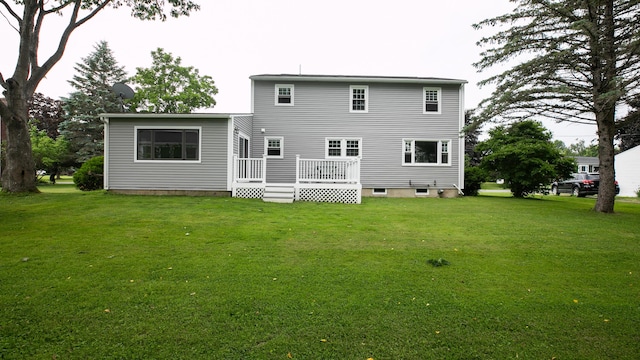 48 Clover Ln, Brewer, ME 04412 - back of property featuring a wooden deck and a yard