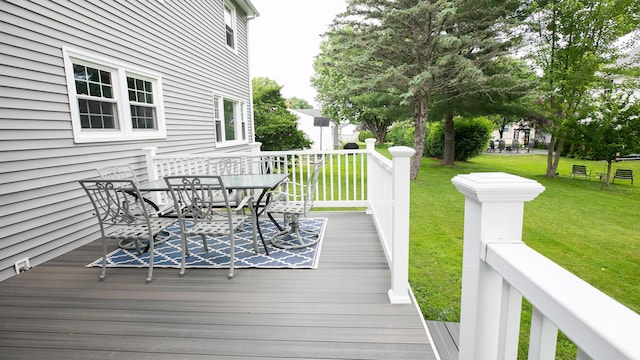 48 Clover Ln, Brewer, ME 04412 - wooden deck featuring outdoor dining space and a yard