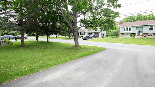 48 Clover Ln, Brewer, ME 04412 - view of asphalt road with entry steps