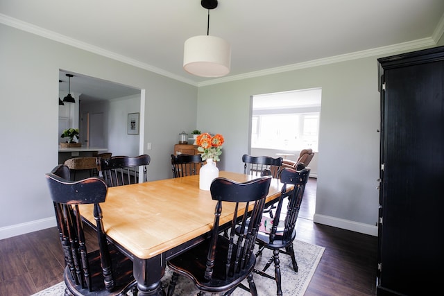 48 Clover Ln, Brewer, ME 04412 - dining area with ornamental molding and dark wood-style floors