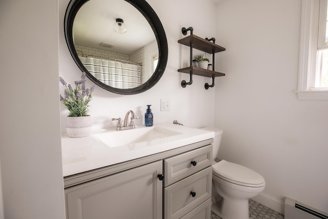 48 Clover Ln, Brewer, ME 04412 - bathroom with a baseboard radiator, vanity, tile patterned flooring, and a shower with shower curtain