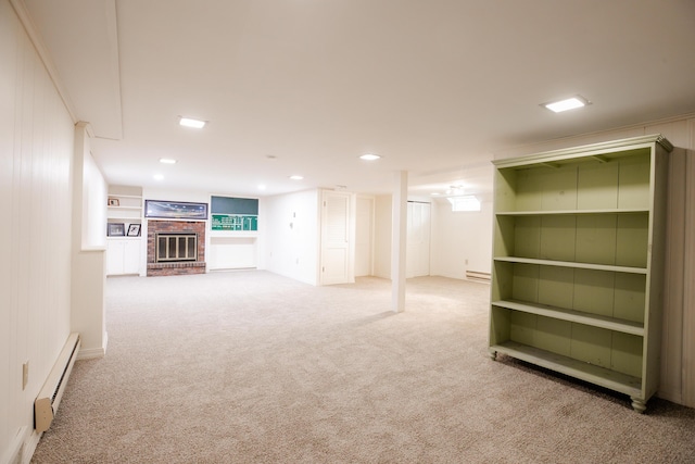 48 Clover Ln, Brewer, ME 04412 - finished basement featuring a baseboard radiator, a fireplace, and carpet floors