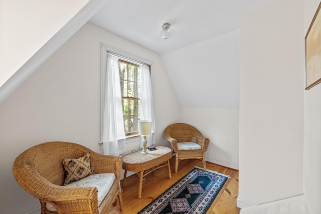 17 Summit St, Ogunquit, ME 03907 - living area with vaulted ceiling and light wood-style floors