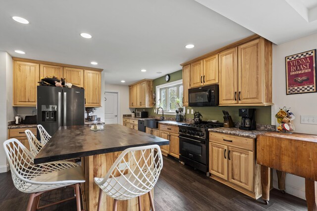 85 Lions Ridge Rd, Alna, ME 04535 - kitchen featuring black appliances, butcher block counters, dark wood-style flooring, a kitchen island, and recessed lighting