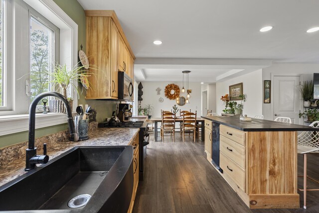 85 Lions Ridge Rd, Alna, ME 04535 - kitchen featuring light brown cabinets, plenty of natural light, recessed lighting, black microwave, and a breakfast bar area
