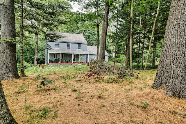 48 Griffin Ave, Hampden, ME 04444 - view of front of property featuring covered porch and roof with shingles