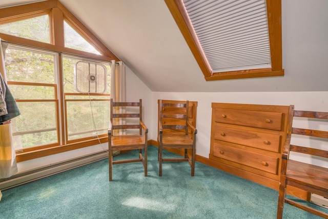 48 Griffin Ave, Hampden, ME 04444 - living area featuring vaulted ceiling, healthy amount of natural light, carpet, and a baseboard radiator