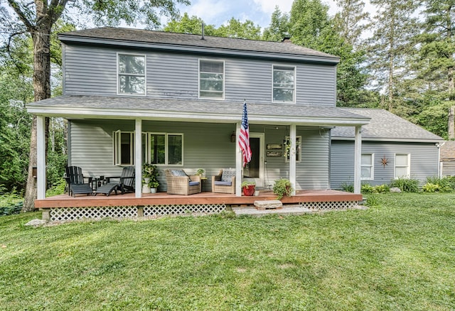 48 Griffin Ave, Hampden, ME 04444 - view of front of house featuring a front yard and a shingled roof