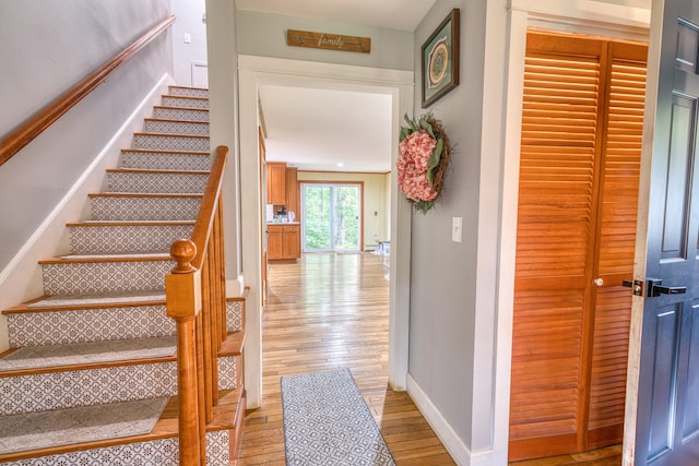 48 Griffin Ave, Hampden, ME 04444 - stairway with wood finished floors and baseboards