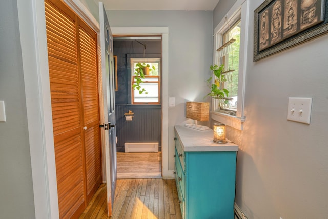 48 Griffin Ave, Hampden, ME 04444 - hallway with light wood-type flooring and baseboard heating