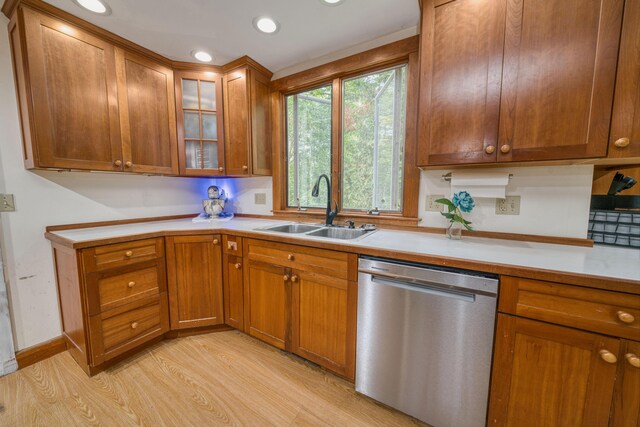 48 Griffin Ave, Hampden, ME 04444 - kitchen featuring dishwasher, light countertops, brown cabinetry, light wood-style floors, and recessed lighting