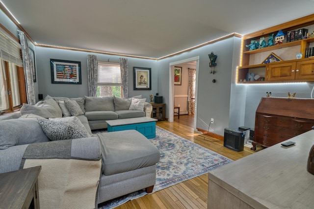 48 Griffin Ave, Hampden, ME 04444 - living room featuring light wood finished floors and baseboards