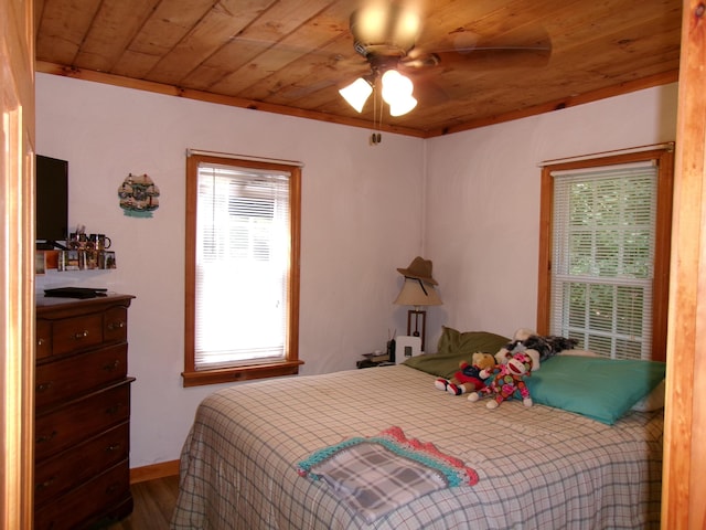 76 Gile Rd, Fayette, ME 04349 - bedroom with wood ceiling, multiple windows, wood finished floors, and a ceiling fan