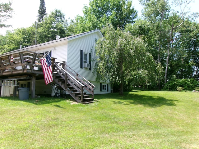 76 Gile Rd, Fayette, ME 04349 - view of home's exterior featuring a wooden deck, a lawn, stairs, and cooling unit