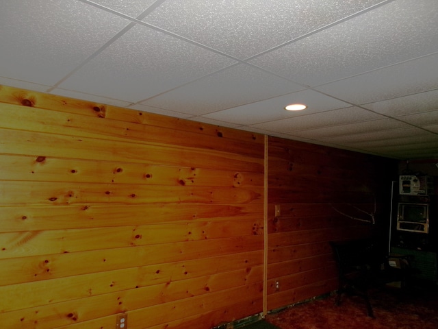 76 Gile Rd, Fayette, ME 04349 - empty room with a drop ceiling, wooden walls, and recessed lighting