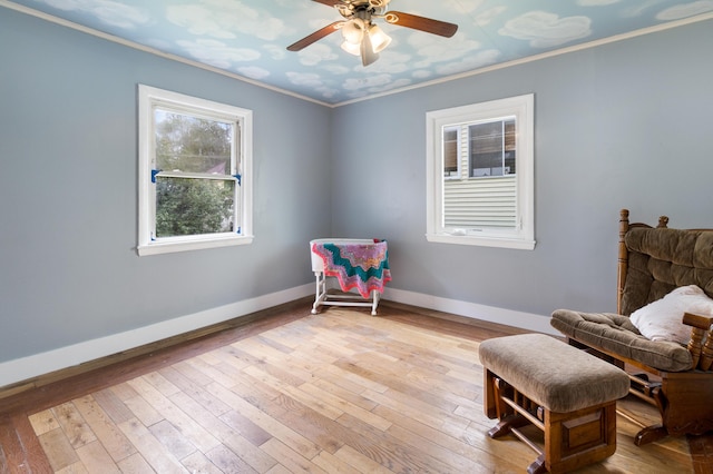 95 Webber Ave, Lewiston, ME 04240 - sitting room featuring crown molding, a ceiling fan, and hardwood / wood-style flooring