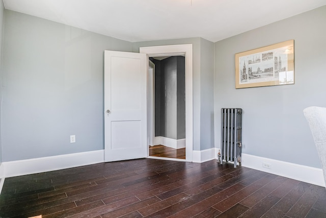 46 Haven Rd, South Portland, ME 04106 - empty room with wood-type flooring and radiator heating unit