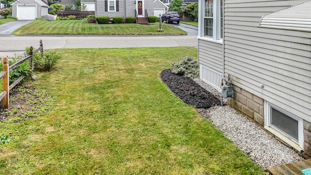 46 Haven Rd, South Portland, ME 04106 - view of yard with driveway and a garage