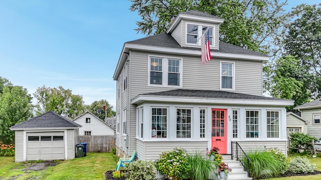 46 Haven Rd, South Portland, ME 04106 - american foursquare style home featuring a detached garage, a shingled roof, entry steps, and an outdoor structure