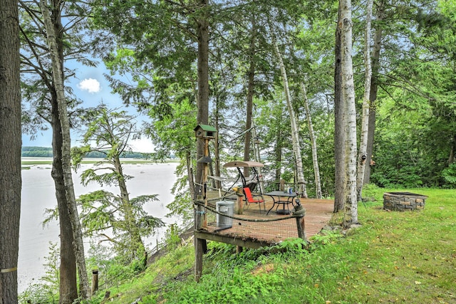 16 Brackett Rd, Dresden, ME 04342 - view of yard with a fire pit and a wooden deck