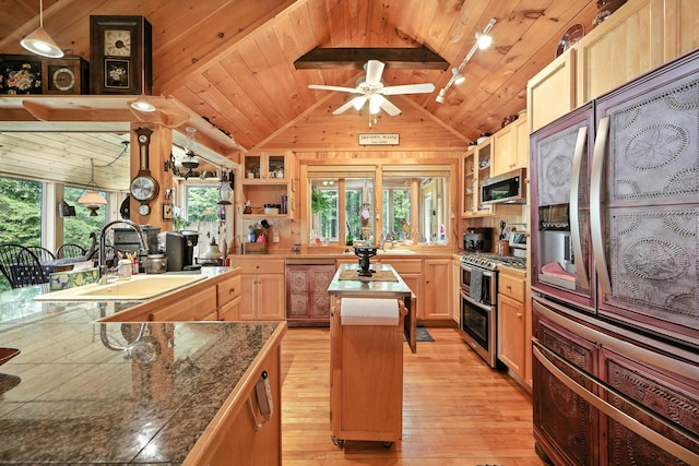 16 Brackett Rd, Dresden, ME 04342 - kitchen featuring stainless steel appliances, a kitchen island, light wood-type flooring, wood ceiling, and ceiling fan