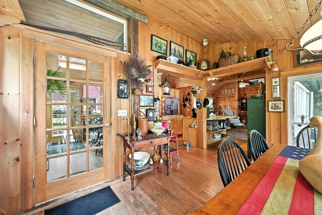 16 Brackett Rd, Dresden, ME 04342 - dining space with wood finished floors, wooden ceiling, and wooden walls
