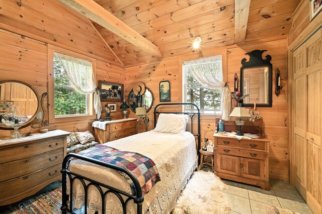 16 Brackett Rd, Dresden, ME 04342 - tiled bedroom with multiple windows, wood walls, and wooden ceiling