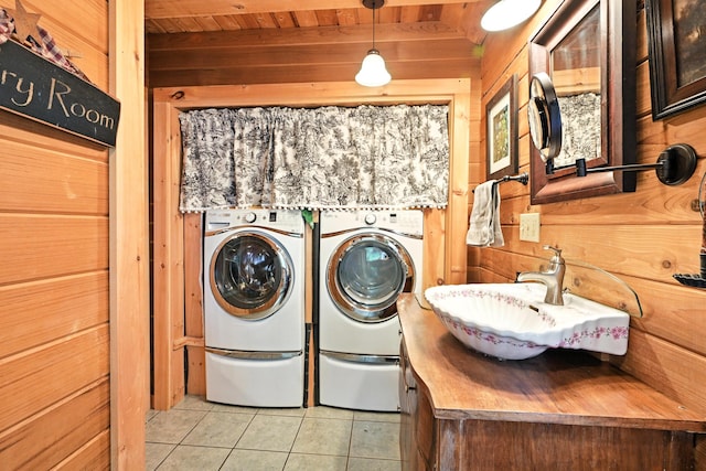 16 Brackett Rd, Dresden, ME 04342 - washroom with washer and dryer, light tile patterned floors, wood walls, and wooden ceiling