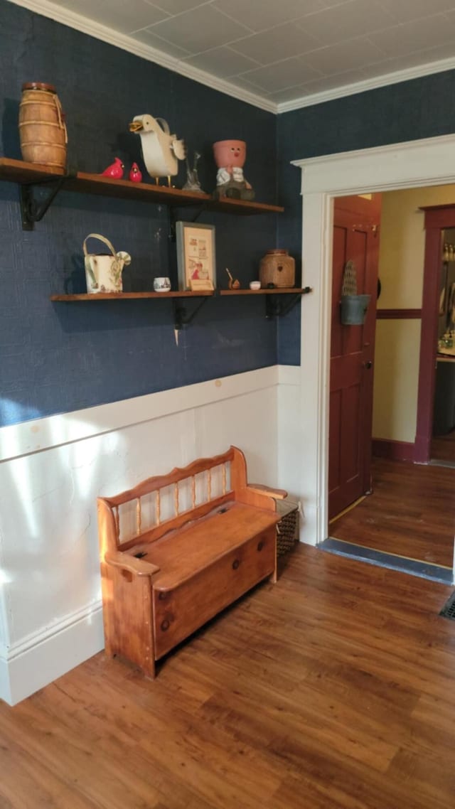 12 High St, Calais, ME 04619 - detailed view of wood finished floors, ornamental molding, and wainscoting