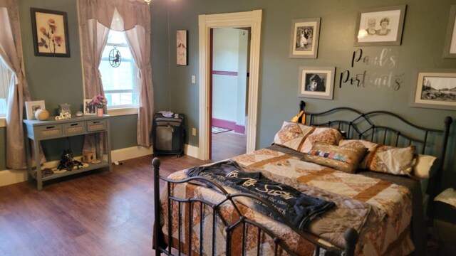 12 High St, Calais, ME 04619 - bedroom featuring dark wood finished floors and baseboards