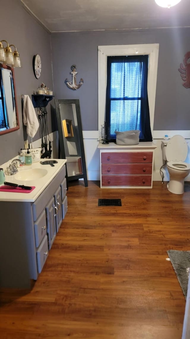 12 High St, Calais, ME 04619 - bathroom featuring vanity and wood finished floors