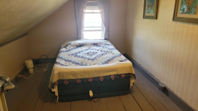 12 High St, Calais, ME 04619 - bedroom featuring hardwood / wood-style floors and lofted ceiling