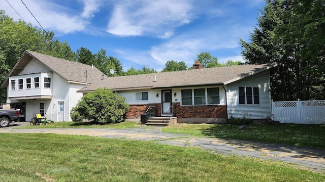 43 Lambert Rd, Brewer, ME 04412 - view of front of home with a chimney and brick siding