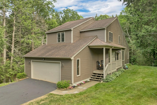 125 Deer Ridge Dr, Barrington, NH 03825 - view of front facade with roof with shingles, a garage, a front yard, and asphalt driveway