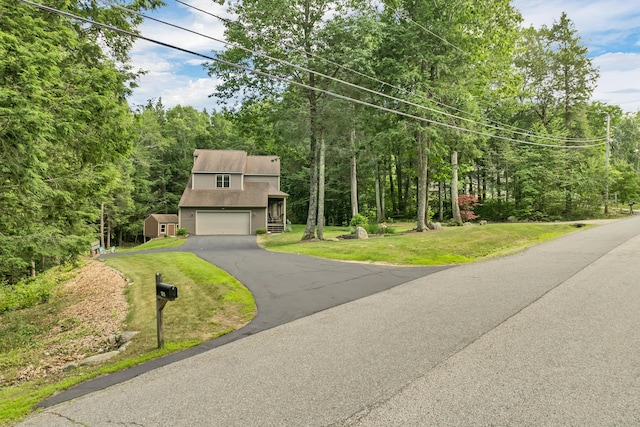 125 Deer Ridge Dr, Barrington, NH 03825 - view of front of property featuring asphalt driveway, a front lawn, and a garage