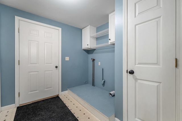 125 Deer Ridge Dr, Barrington, NH 03825 - laundry room featuring baseboards and light flooring