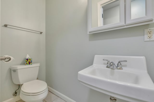 8 Woodside Dr Unit 1, Gorham, ME 04038 - half bathroom with baseboards and tile patterned floors