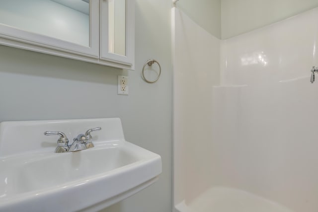 8 Woodside Dr Unit 1, Gorham, ME 04038 - bathroom featuring a sink and a shower
