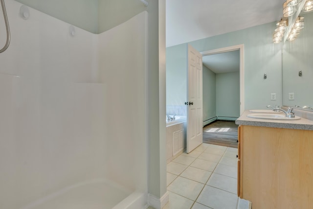 8 Woodside Dr Unit 1, Gorham, ME 04038 - full bath featuring tile patterned flooring, a shower, double vanity, and a bath