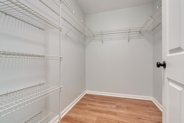 8 Woodside Dr Unit 1, Gorham, ME 04038 - spacious closet with light wood-type flooring