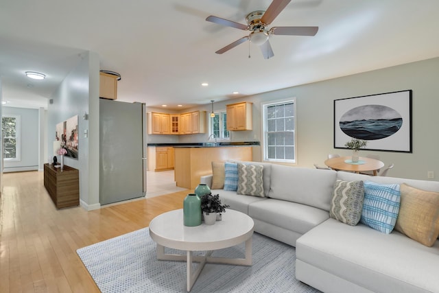 8 Woodside Dr Unit 1, Gorham, ME 04038 - living room with light wood-style floors, a ceiling fan, baseboard heating, and recessed lighting