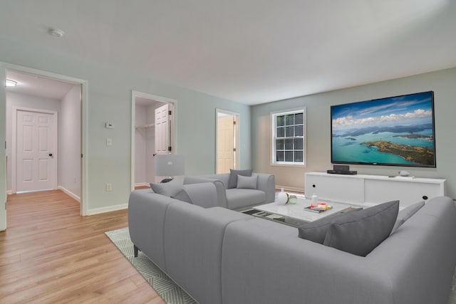 8 Woodside Dr Unit 1, Gorham, ME 04038 - living area featuring light wood finished floors and baseboards