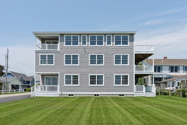 42 Rachel Carson Ln, Wells, ME 04090 - rear view of house featuring a lawn