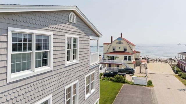 42 Rachel Carson Ln, Wells, ME 04090 - view of property exterior with a water view and a central air condition unit