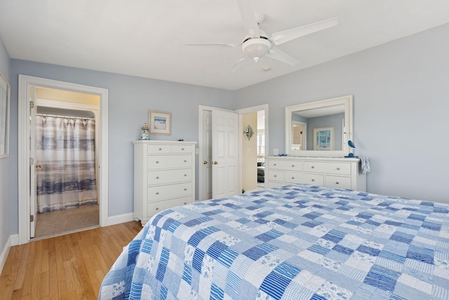 42 Rachel Carson Ln, Wells, ME 04090 - bedroom with light wood-style flooring, a ceiling fan, and ensuite bath