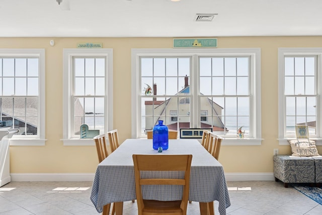 42 Rachel Carson Ln, Wells, ME 04090 - dining space with light tile patterned flooring and healthy amount of natural light