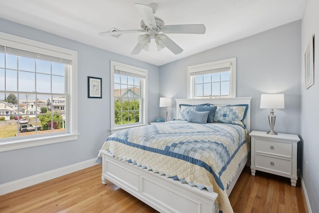 42 Rachel Carson Ln, Wells, ME 04090 - bedroom with light wood-style flooring and ceiling fan