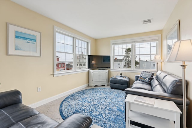 42 Rachel Carson Ln, Wells, ME 04090 - living area with baseboards and light tile patterned floors